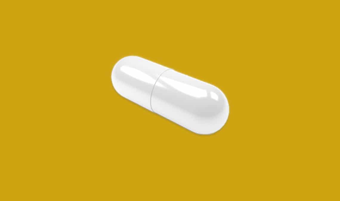 Pill on gold background